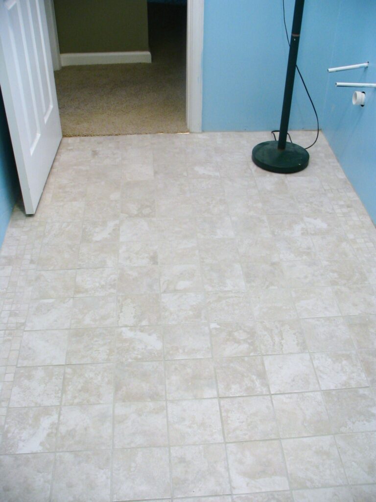 Basement Bathroom Floor Tile after Grouting