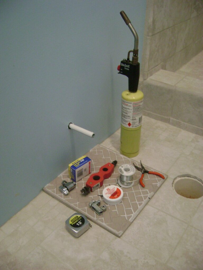 Basement Bathroom Plumbing: Soldering Gear for Toilet Stop Valve