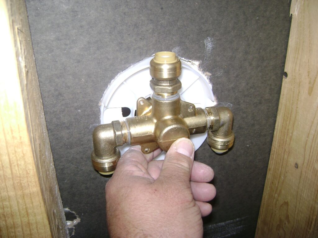 Basement Bathroom Plumbing: Mounting the Shower Valve