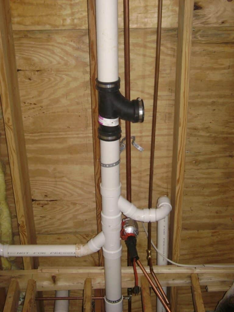 Basement Bathroom Sewer Line Connection: Fernco Ell Fitting