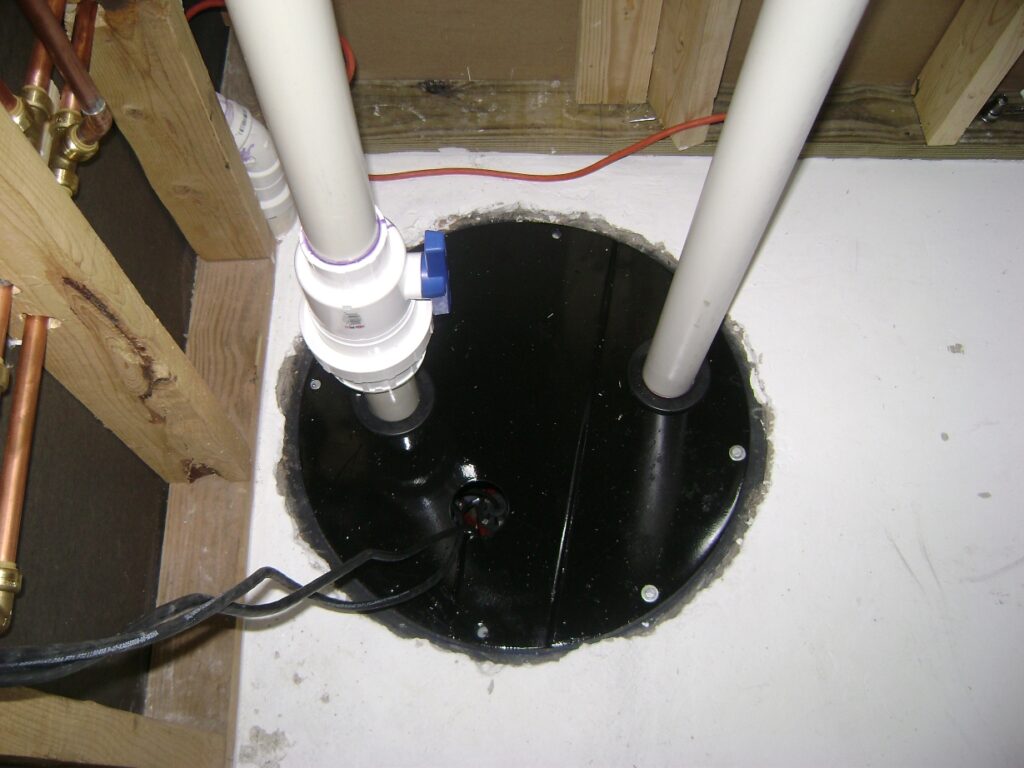 Basement Bathroom Plumbing: Sewage Basin PVC Waste and Vent Pipes