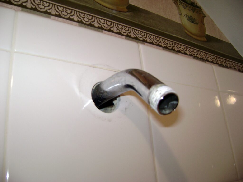 Shower Leak inside the Wall: Shower Arm and Wall Tile