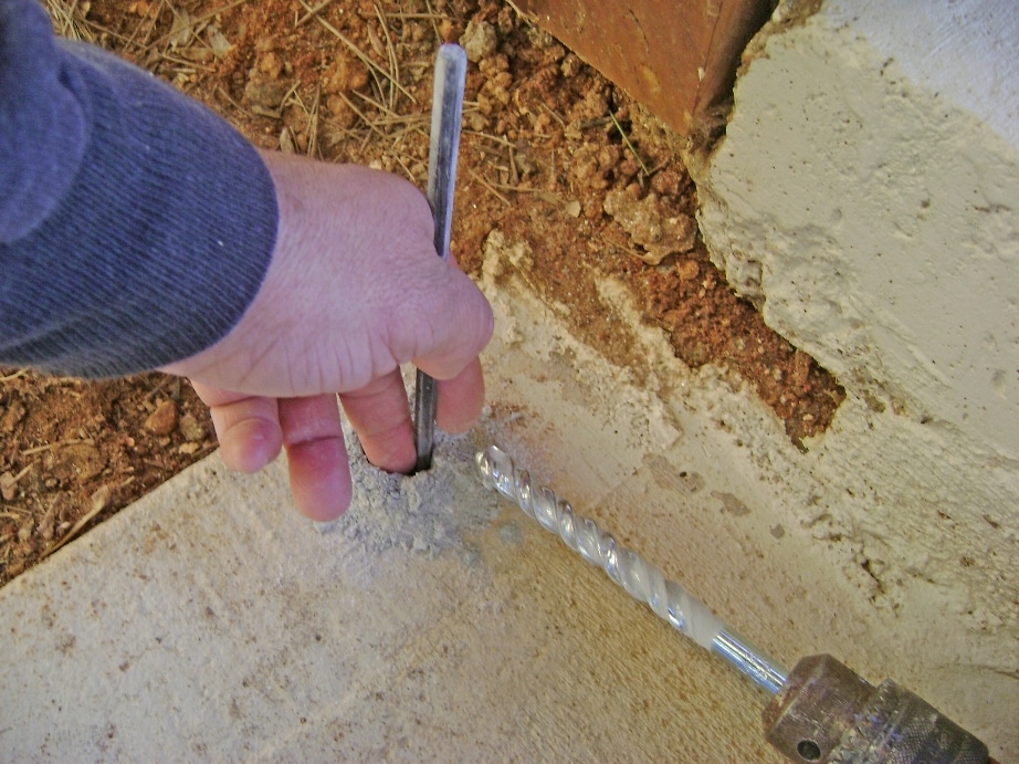 Build a Deck Rail on a Concrete Patio: Check Hole Depth for Concrete Anchor