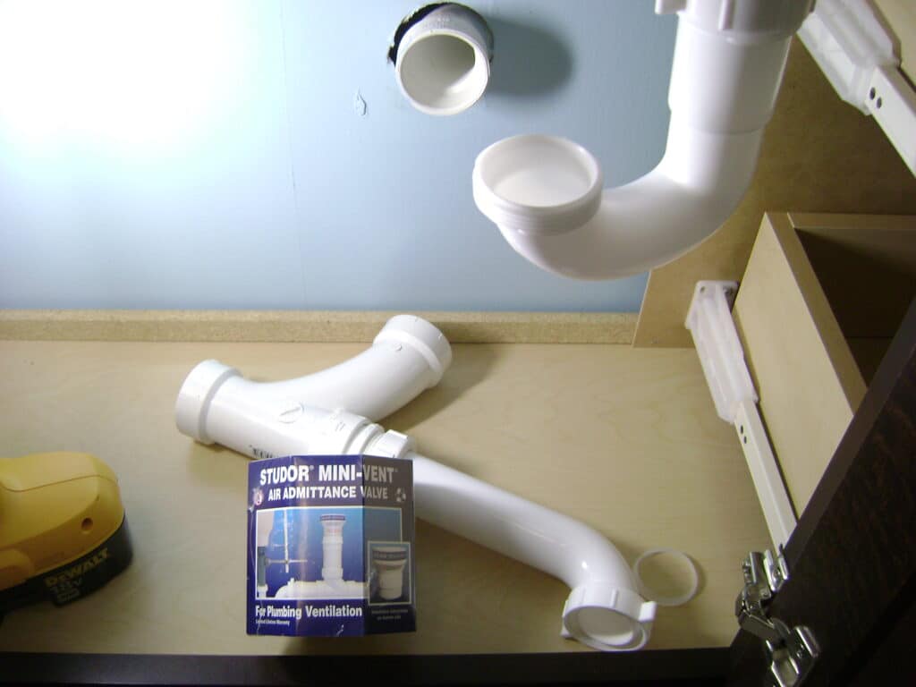 Bathroom Sink Drain Plumbing: Studor Mini Vent and PVC P-trap