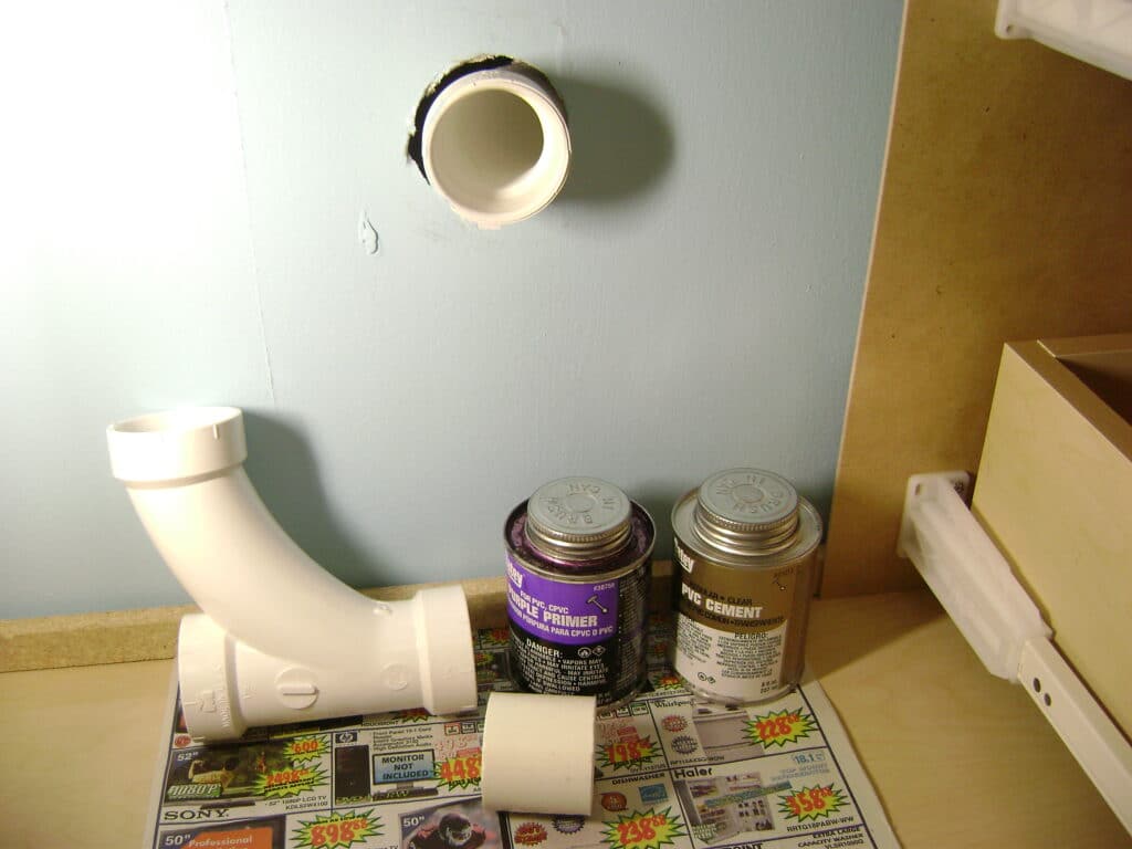 Bathroom Sink Drain: Ready to Glue the PVC Wye to the Drain Line