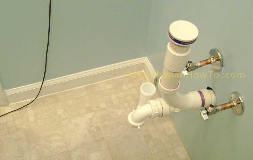 Basement Bathroom Baseboard and Sink Plumbing
