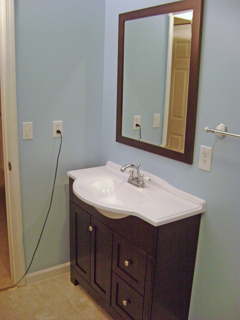 Basement Bathroom Vanity and Mirror