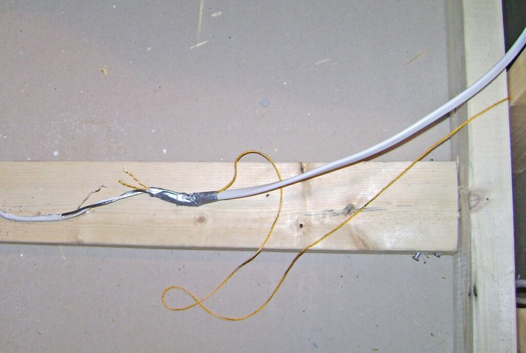 Fishing NM-B 14/2 Cable in the Wall: Vanity Light Switch Wire Pulled to Crawlspace