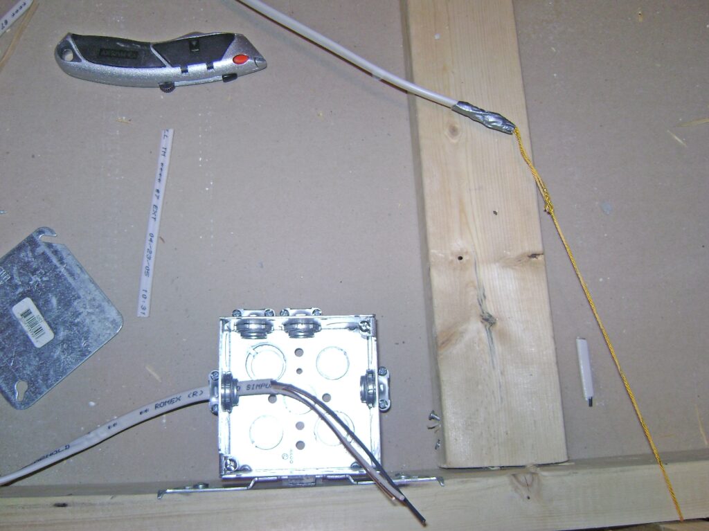Basement Bathroom Wiring: Line Side Cable Clamped inside the Junction Box