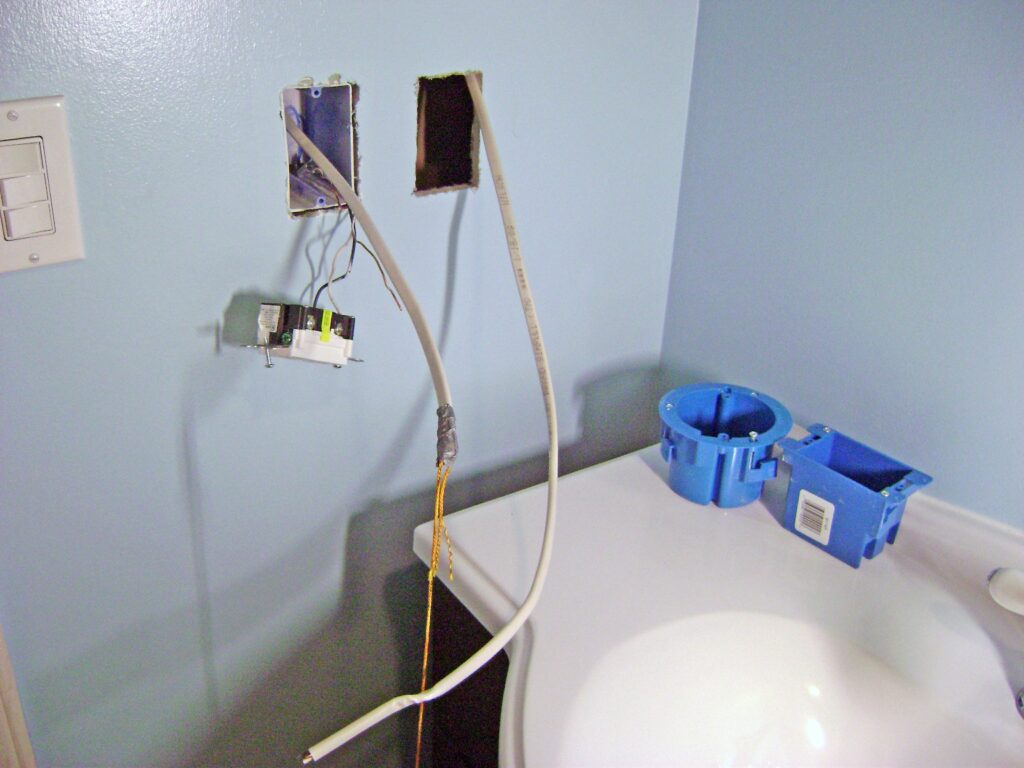 Bathroom Wiring: Fishing NM-B 14/2 Cable through the Wall
