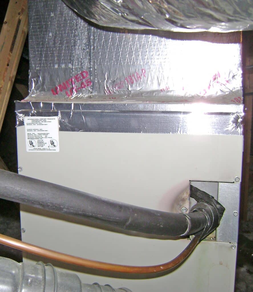 Air Conditioner Evaporator Coil Access Panel Sealed with HVAC Tape