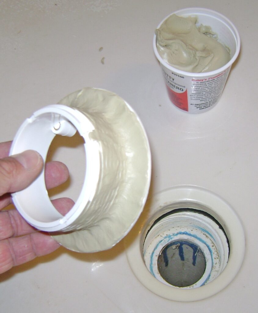 Shower Drain Body Packed with Plumbers Putty