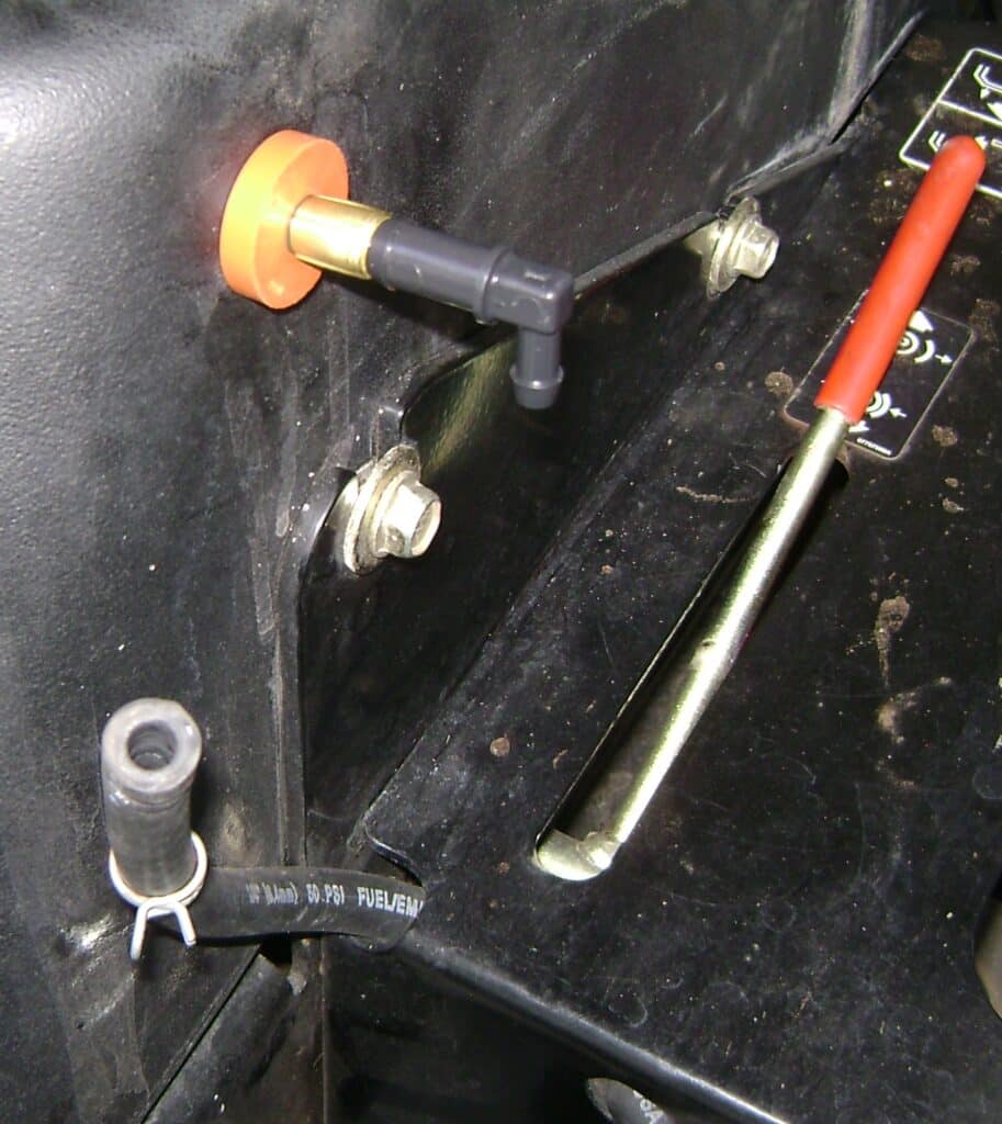 Insert the Rubber Grommet into the Fuel Tank Sidewall