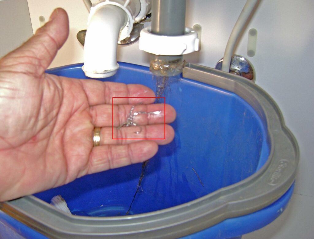 Retrieve Lost Item in Sink Drain: Earring Retrieved from the P-Trap