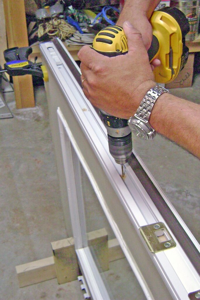 Exterior French Door Repair: Drill Pilot Holes for the Astragal Mounting Screws