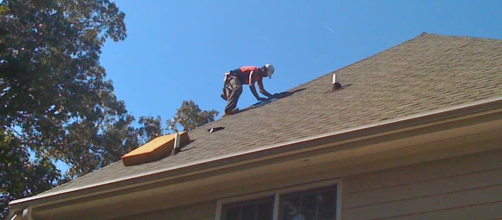 Leaky Vent Pipe Flashing Repair: Roofer Getting into Position
