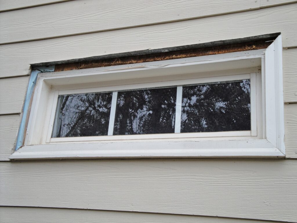 Window Repair: Rotted Sections of Casing Removed