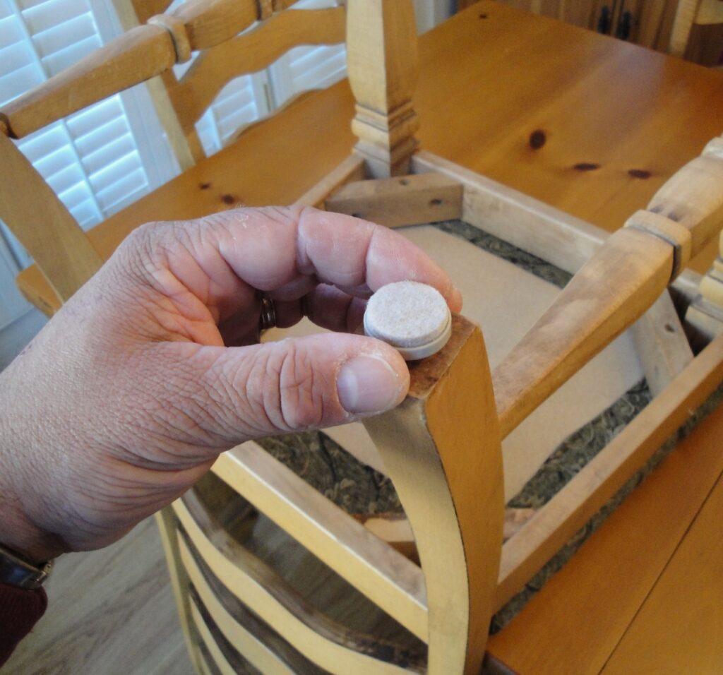 Install Nail-On Felt Chair Leg Pads: Center the Pad