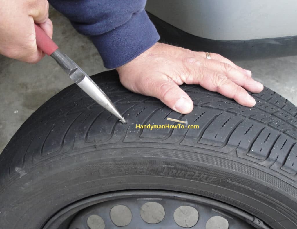 Fix a Flat Car Tire: Remove the Metal Object with Needle Nose Pliers