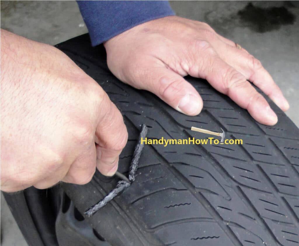 How to Plug a Flat Car Tire: Press the Tire Plug in with the Needle Tool