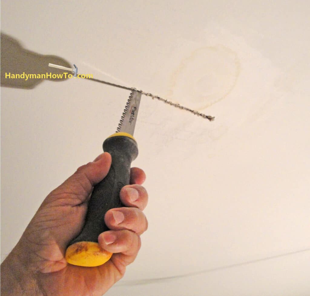 Water Damaged Drywall Ceiling Repair: 1st Cut with the Drywall Jab Saw