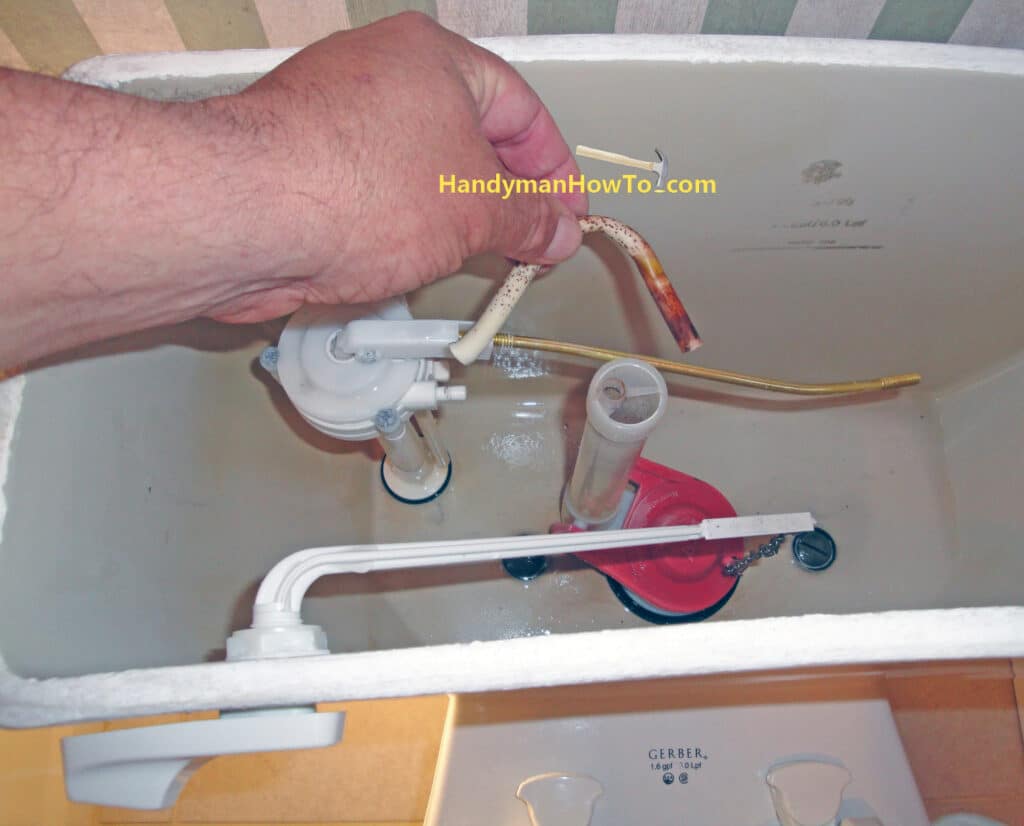 Replace a Toilet Fill Valve: Remove the Refill Tube