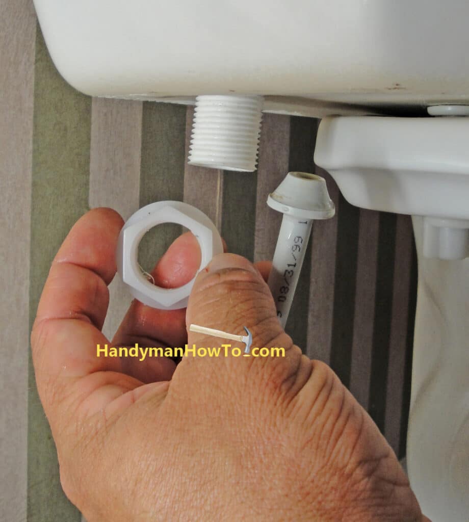 Replace a Toilet Fill Valve: Lock Nut and Toilet Tank