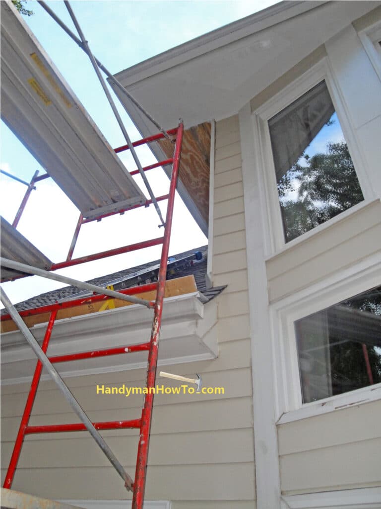 Rotted Soffit Repair: Reattached Gutter with new Soffit and Fascia