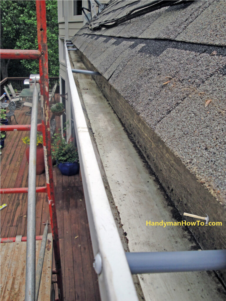 Gutter Cleaned, Repitched and Fastened with Gutter Screws