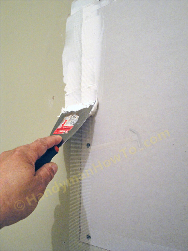 Drywall Repair Panel Finish: Mud the Taped Joints