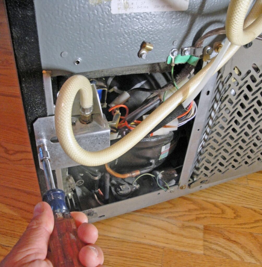 Leaky Refrigerator Repair: Remove the Water Valve Bracket