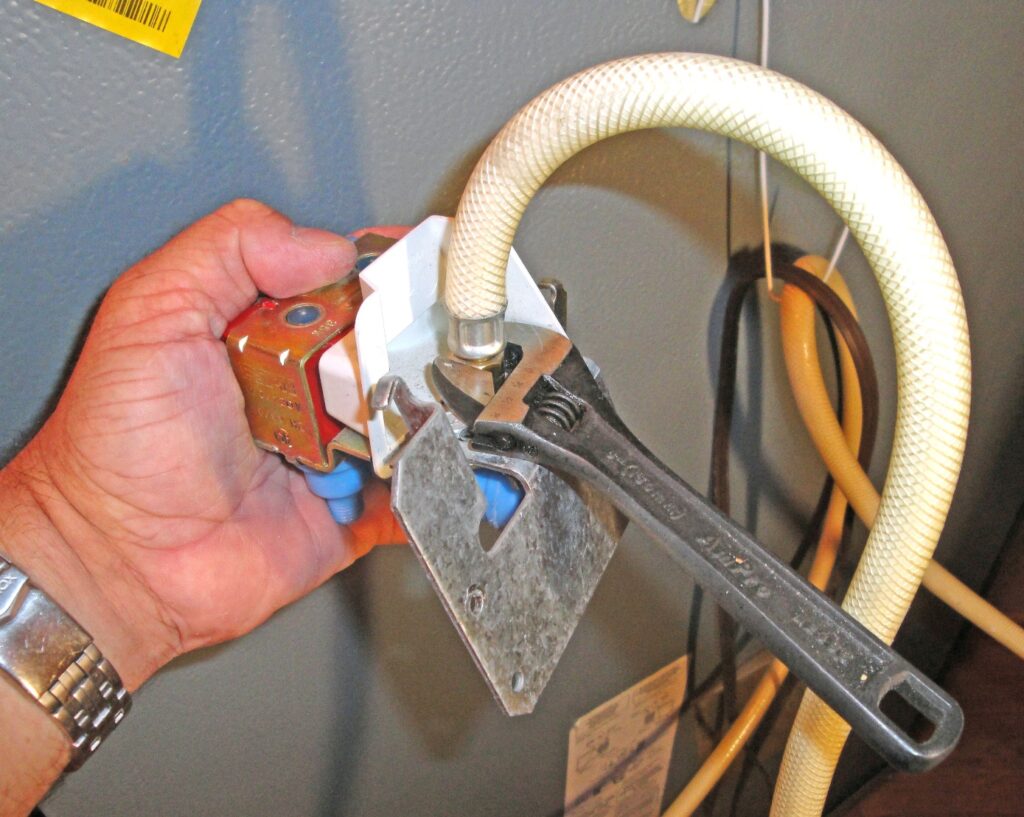Disconnect the Water Supply Hose from the Refrigerator Water Valve