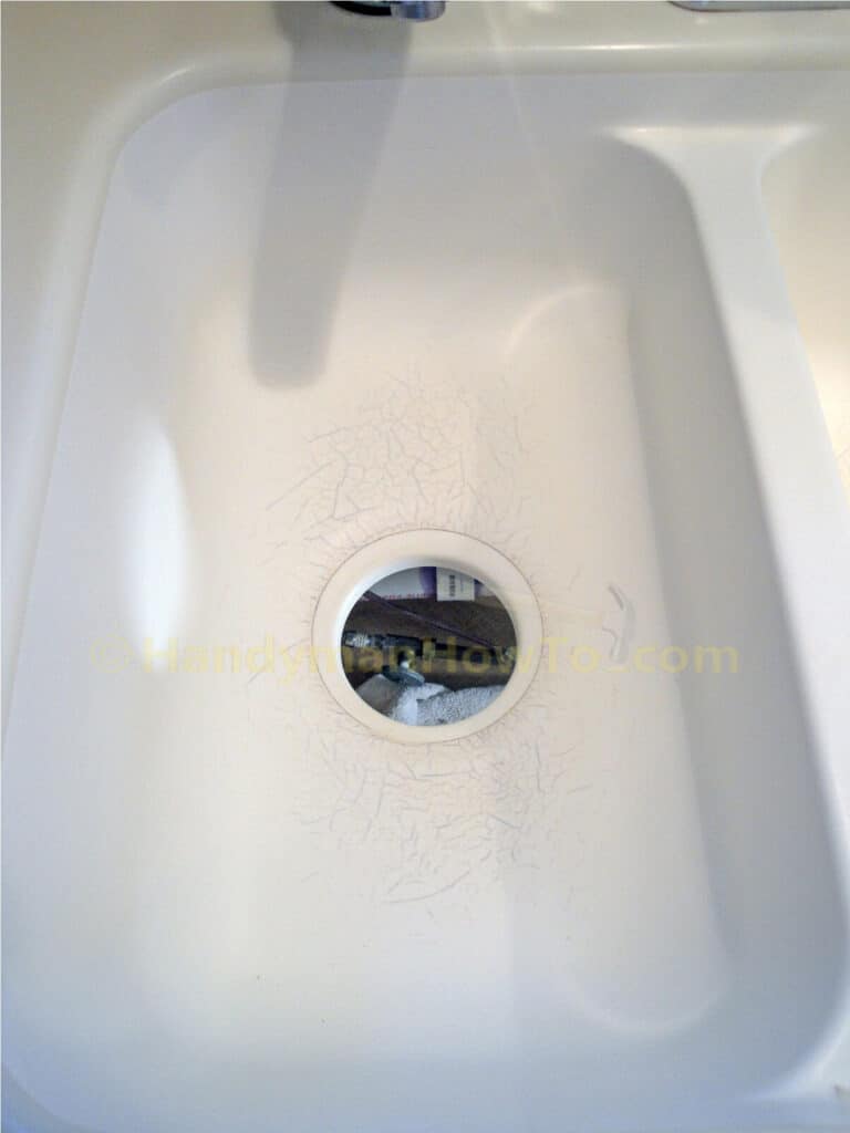 Garbage Disposal Sink Drain Hole Cleaned of Plumber's Putty