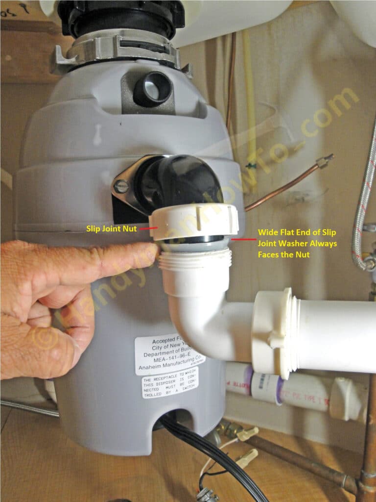 Connect the Garbage Disposer Discharge Elbow to the Waste Arm Plumbing