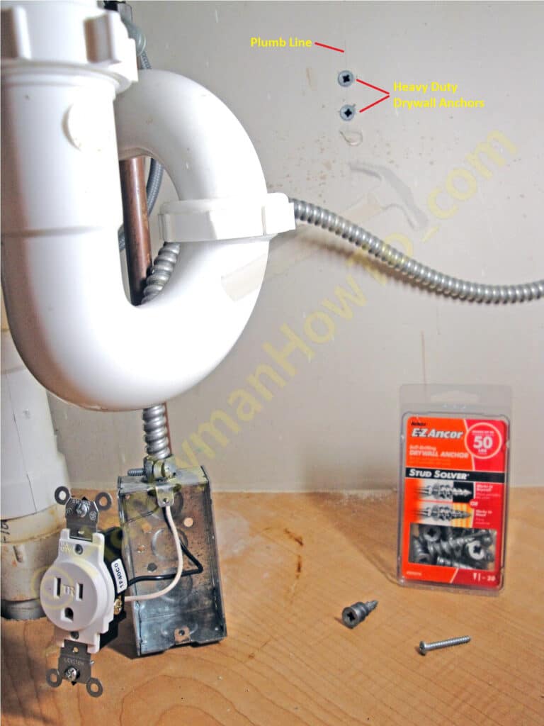 Plumb Line and Drywall Anchors for the Kitchen Sink Outlet
