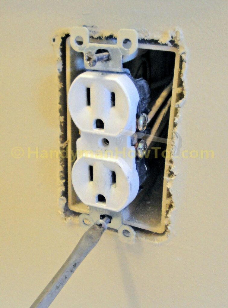 Remove the Electrical Outlet Mounting Screws