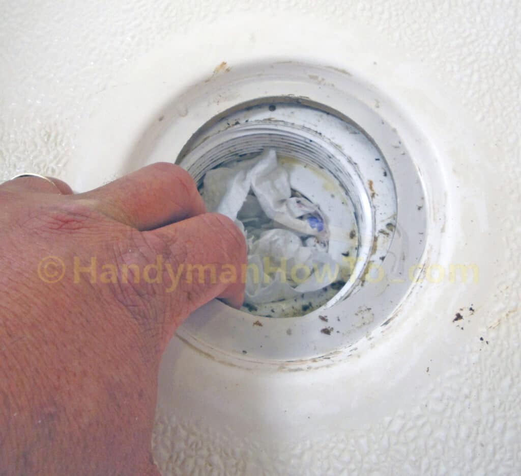 Shower Drain Leak Repair: Partially Cleaned Shower Drain