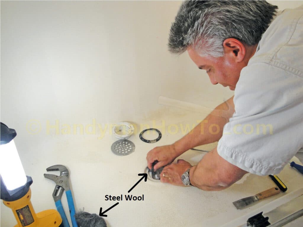 Leaky Shower Drain Repair: Polish the Shower Drain with Steel Wool