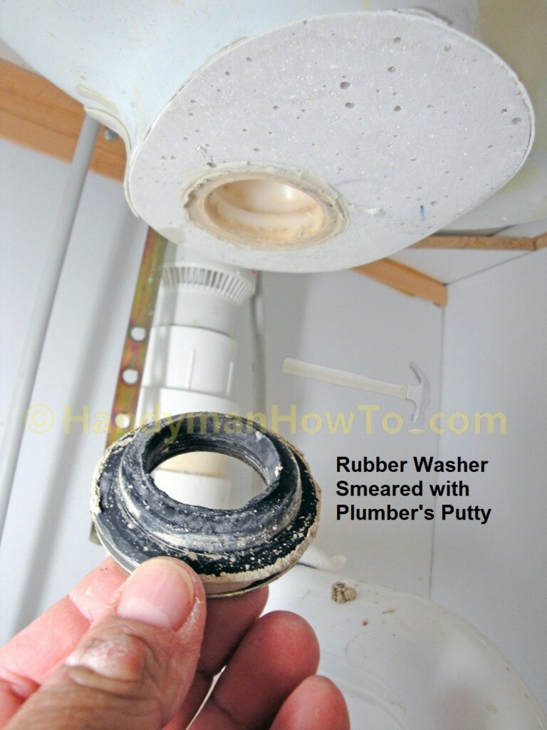 Pop-Up Sink Drain Repair: Remove the Rubber Gasket and Metal Washer