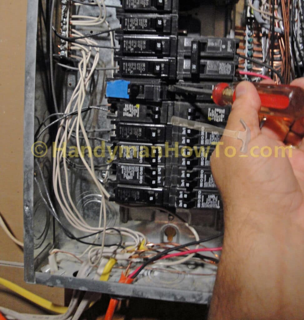 Remove a Circuit Breaker: Pry up to release