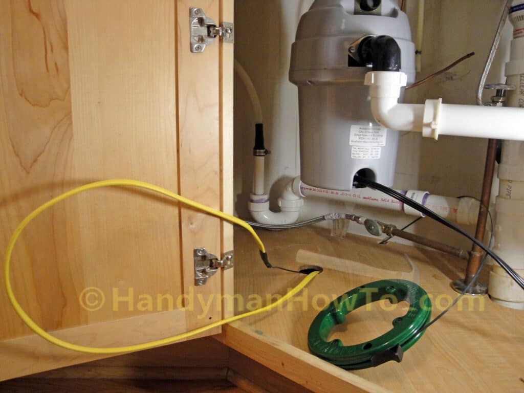 Fishing the NM-B Cable to the Kitchen Sink Cabinet Wall