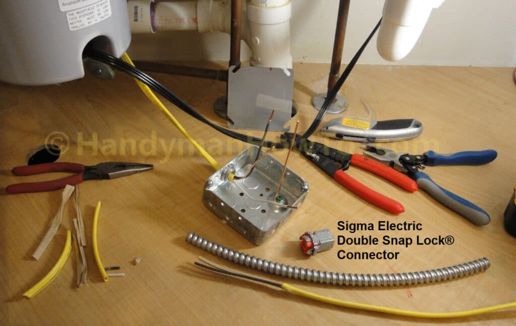 Wiring the Under Kitchen Sink Junction Box: NM Cable Clamp & Ground Wire