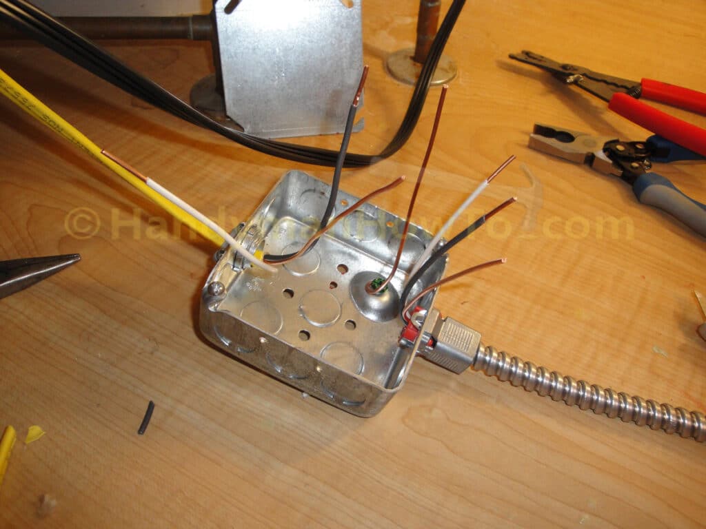 UUnder Kitchen Sink Outlet: Junction Box Wires and Flex Metal Conduit (FMC)