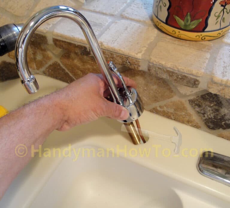 Insert the Westbrass Velosah Instant Hot Water Faucet into the Kitchen Sink