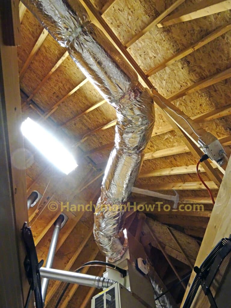 Round Sheet Metal Ductwork: View from Attic Stairway