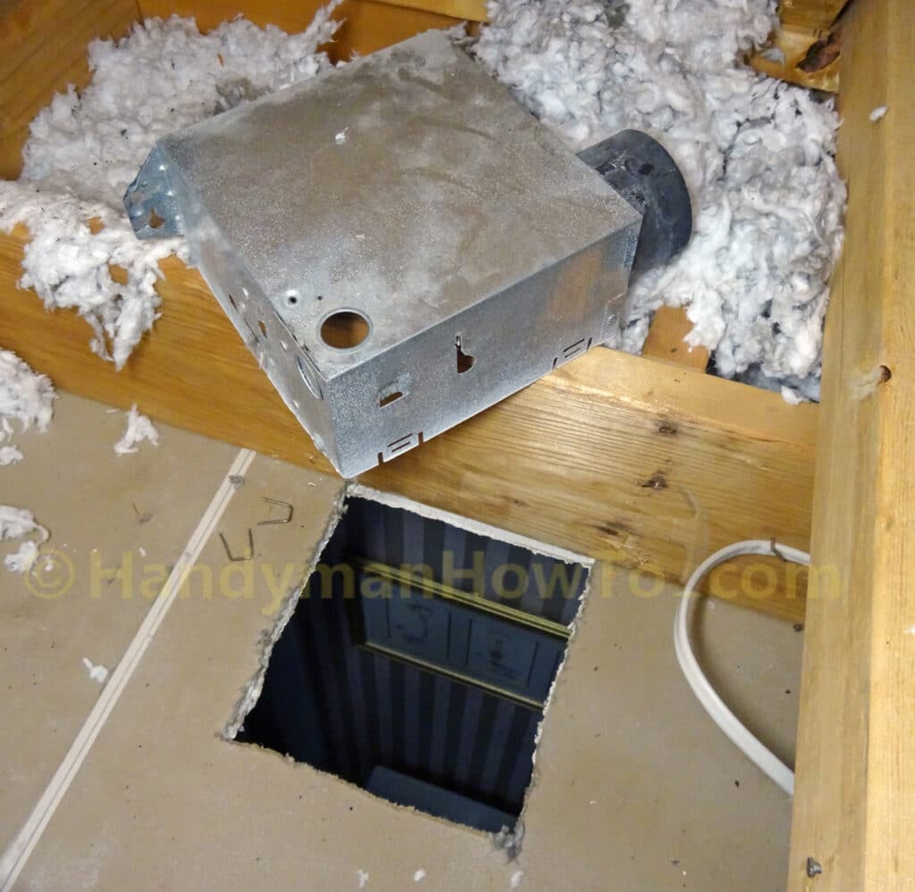 Bathroom Vent Fan Removal from the Attic Ceiling Joist