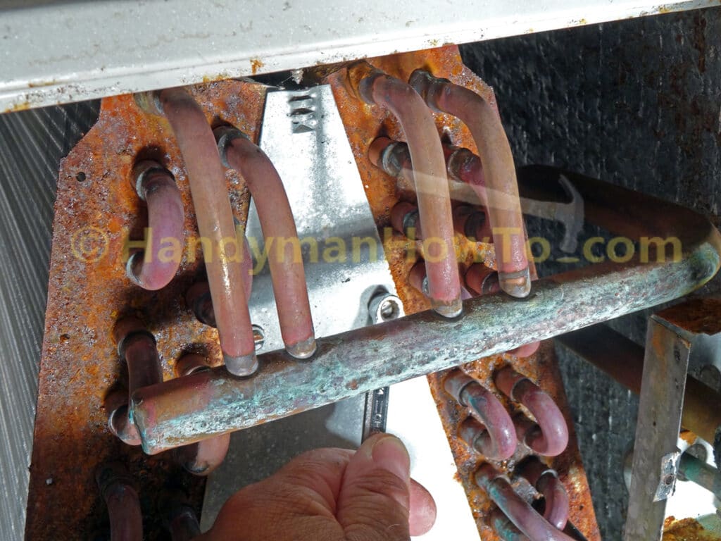 AC Evaporator Coil Front Plate Removal: Screws behind the Suction Manifold