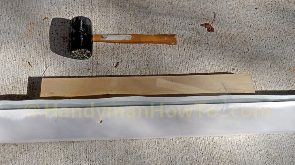 Mallet and Board Sheet Metal Brake to Bend Deck Ledger Board Flashing
