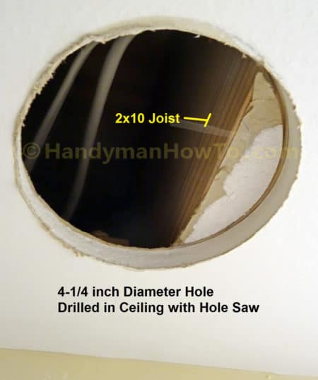 4.25 inch Hole in Ceiling for Fishing Electrical Cable - Overlaps Joist Edge